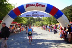 Selina crossing the line, 2nd in the women's division